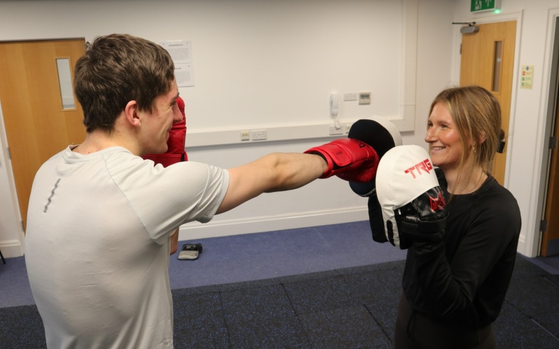 Chelsea and Adam at a boxing session, sparring