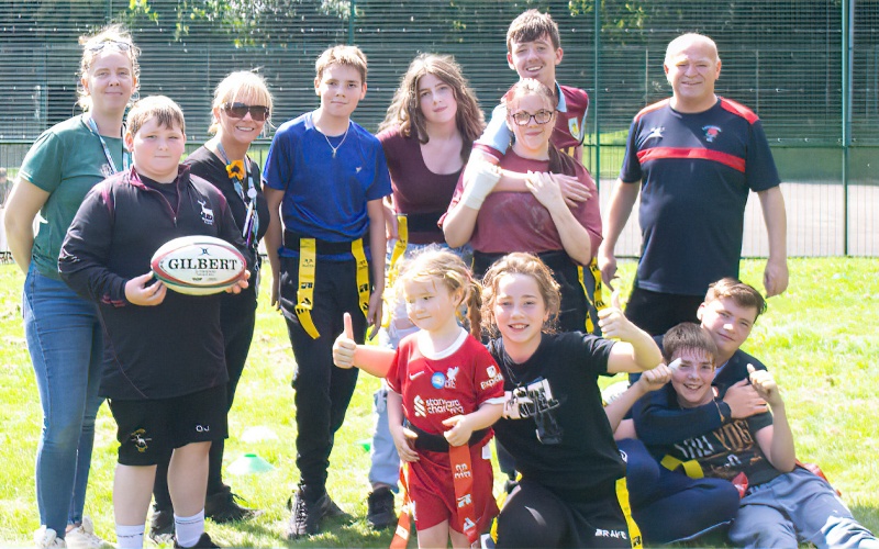 Some of the young attendees with (adults, from left) Lisa Spencer (Youth Worker), Natalie Laird (Family Intensive Support Worker, Lancashire County Council) and Ian Jones (RUFC coach).